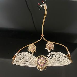 Choker, necklace, and earring’s